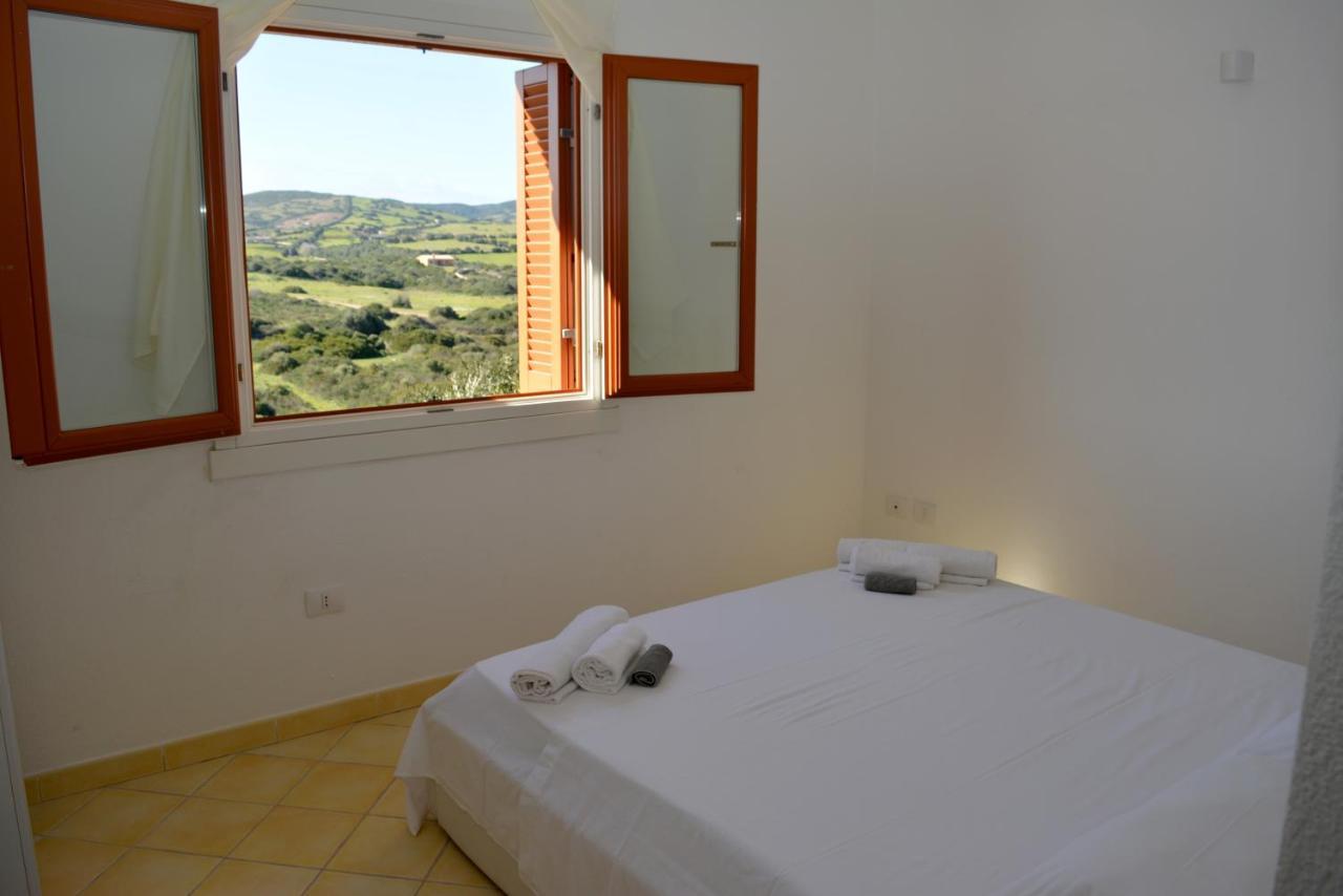 Appartamenti Residence Zodiaco Porto Pozzo Exteriör bild