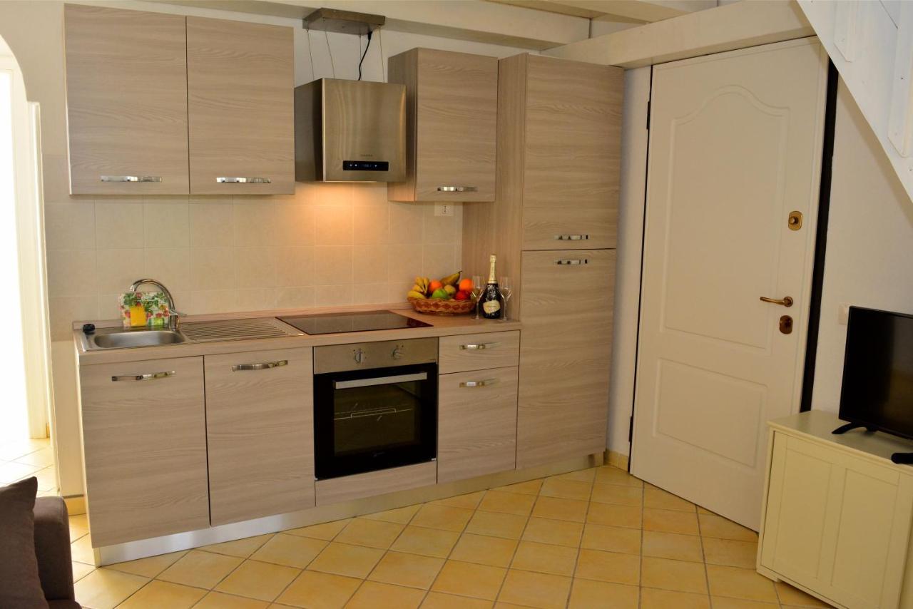 Appartamenti Residence Zodiaco Porto Pozzo Exteriör bild